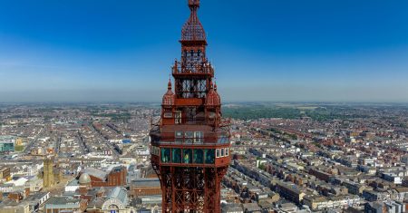 A drone view of the Blackpool Tower in Blackpool, England in the daylight